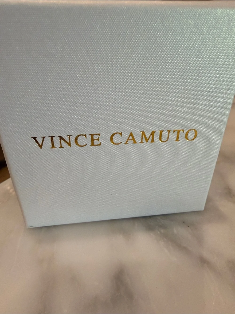 Vince Camuto shiny oval